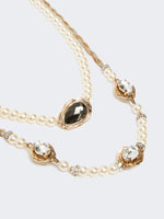 Pearl and rhinestone-adorned necklace