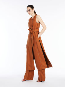 Long linen waistcoat with piping