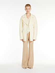 Flared stretch wool trousers